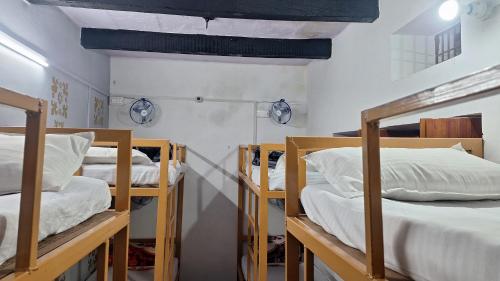 Postel nebo postele na pokoji v ubytování singh homestay