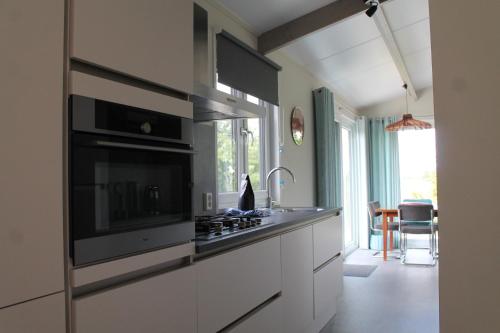 Gambar di galeri bagi Luxe 2 persoons chalet met Hottub di Teuge