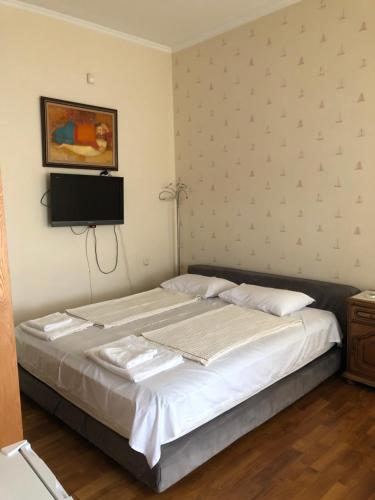 Una cama o camas en una habitación de Villa Kobuleti