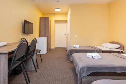Ένα ή περισσότερα κρεβάτια σε δωμάτιο στο Guest House RELAX PALANGA