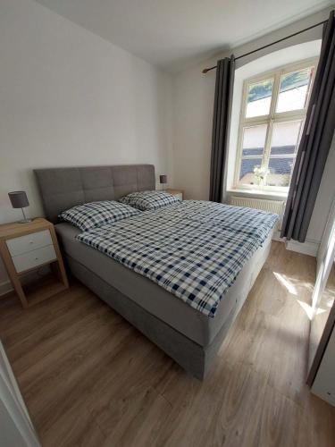 En eller flere senge i et værelse på Marie