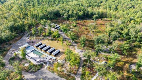an overhead view of a house in a forest at CHICKADEE LIMIT 4 in North Sebago