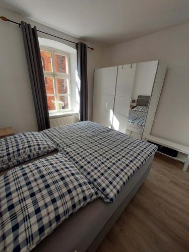 En eller flere senge i et værelse på Marie