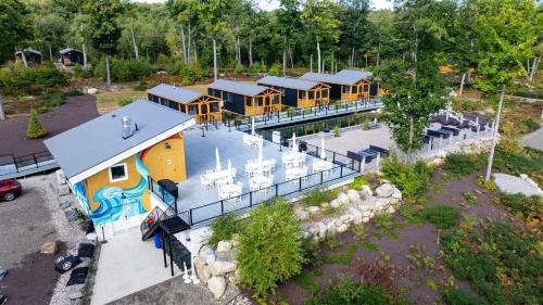 an aerial view of a resort with a water park at TITMOUSE LIMIT 4 cabin in North Sebago