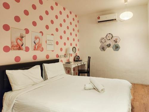 Cama o camas de una habitación en Elephant House Hotel