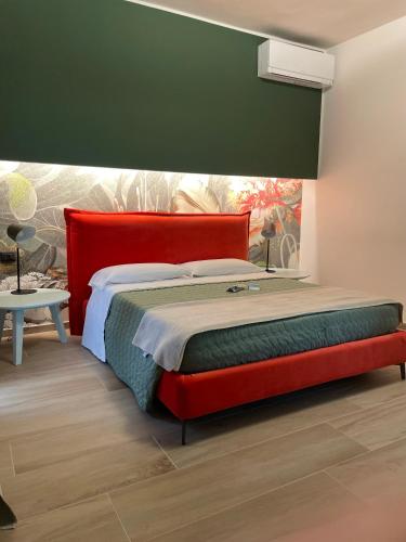 Postel nebo postele na pokoji v ubytování Agriturismo Uliveto Bartolomeo