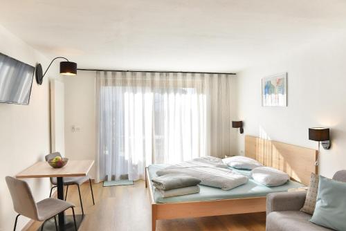 Postel nebo postele na pokoji v ubytování Haus Rosengarten