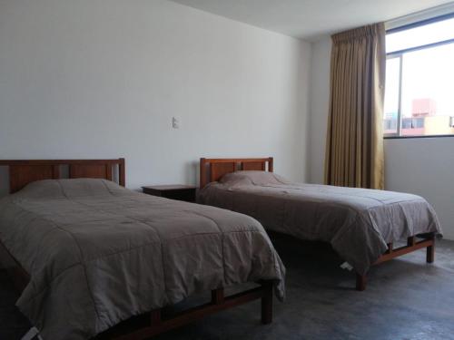 Postel nebo postele na pokoji v ubytování Casa Extremadura