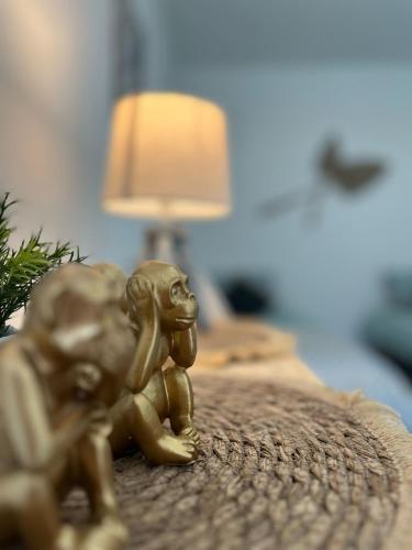 Una cama o camas en una habitación de Le Gite de la Menuiserie