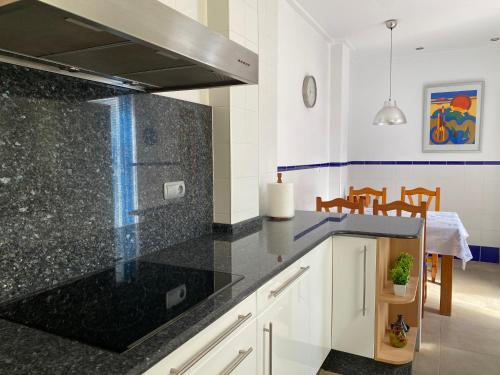 Kuchyň nebo kuchyňský kout v ubytování Domus Belle Home Valencia