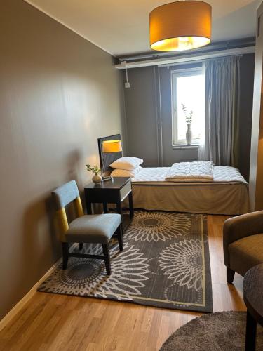 Cama o camas de una habitación en Esplanadens vandrarhem i Oxelösund