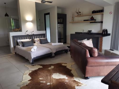 Ένα ή περισσότερα κρεβάτια σε δωμάτιο στο 69 Lagoon Suite