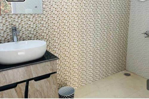 Koupelna v ubytování Vrindam Farm