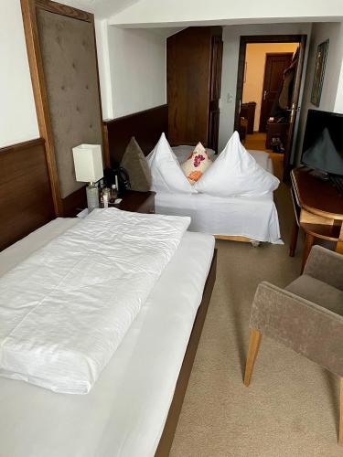 Katil atau katil-katil dalam bilik di Hotel & Chalet Montana