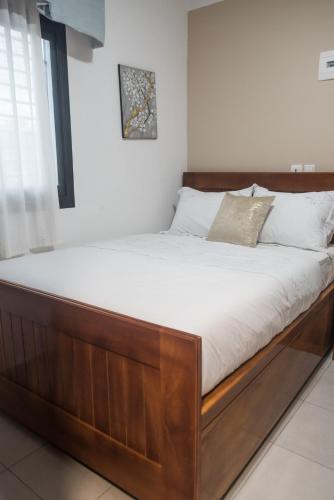 Cama o camas de una habitación en At home Douala Cameroun