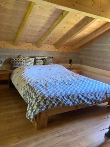Postel nebo postele na pokoji v ubytování Les Maisons de la Glappaz