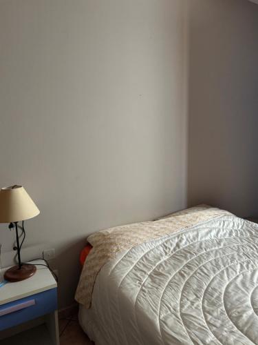 Una cama o camas en una habitación de Giuly Apartment