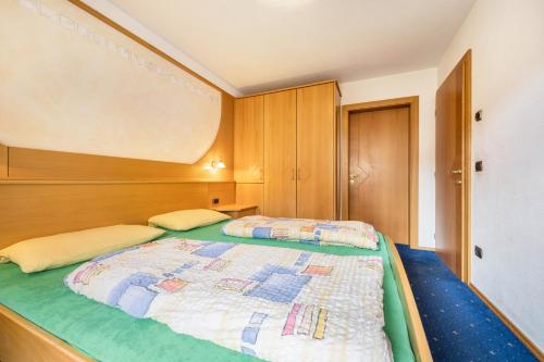 Postel nebo postele na pokoji v ubytování Residence Oberhauser