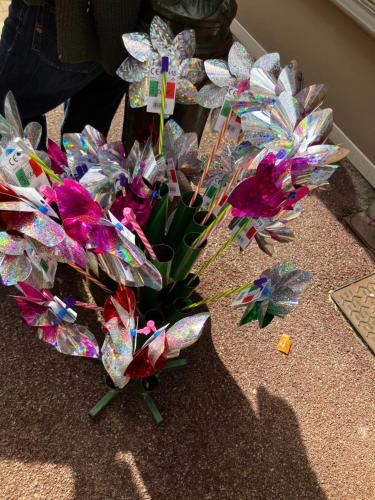 a bunch of colorful glass flowers on the floor at Trouville Palace Le Bonheur in Trouville-sur-Mer