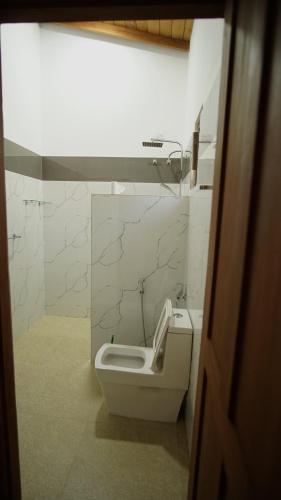 Un baño de Neos Palm Paradise