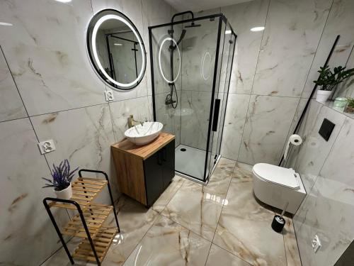Ένα μπάνιο στο Ferienwohnung in Parknähe 2