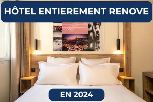 a bed with white pillows in a hotel apartment room at Best Western Kobalt Annecy Nord - Epagny in Épagny