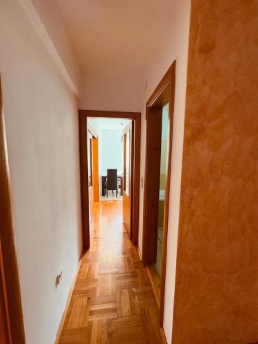 an empty room with a hallway with two open doors at Apartment Silence B in Pluzine