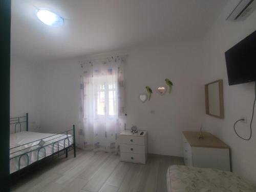 Postel nebo postele na pokoji v ubytování Anna e Mary