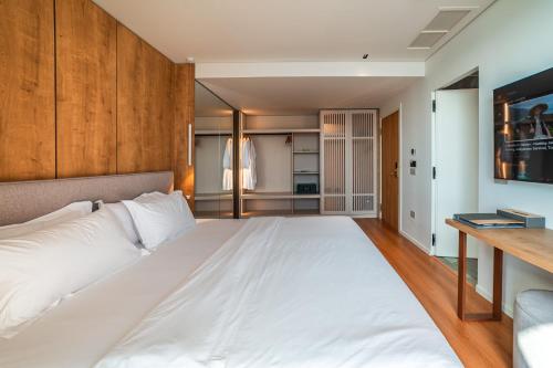 Postel nebo postele na pokoji v ubytování Hotel Vale