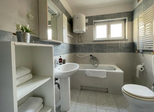 Koupelna v ubytování Apartments Morgan