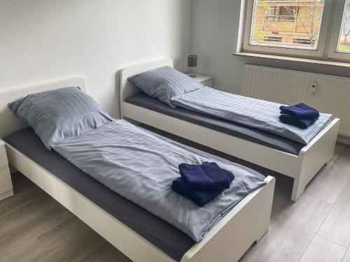 Postel nebo postele na pokoji v ubytování bookandstay24 Dietzenbach 2 Zimmerwohnung mit Balkon, Küche und Parkplatz-10