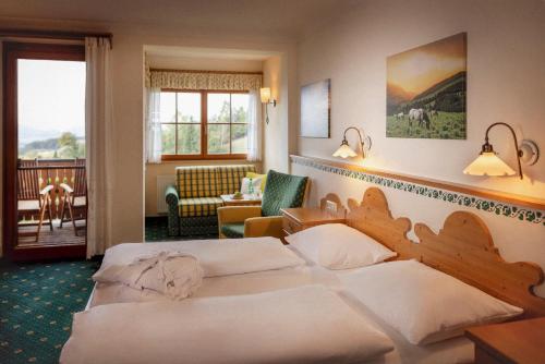 Postel nebo postele na pokoji v ubytování Landhotel Spreitzhofer