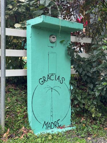 a green box with a picture of a door on it at New Premium Jungle Cabin in Big Creek