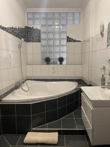Kúpeľňa v ubytovaní Thermal Next II Weninger Apartman Kiskunhalas