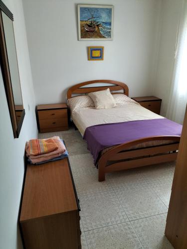 En eller flere senge i et værelse på Casa familiar Sanabria