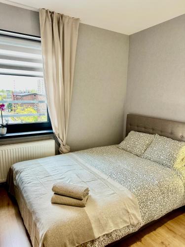 Postel nebo postele na pokoji v ubytování Apartamenty Poziom 4, Prywatna łazienka, Wspólna toaleta, Free wi-fi, Free Parking