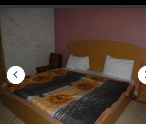 Postel nebo postele na pokoji v ubytování Kesandra Hotel & Suites