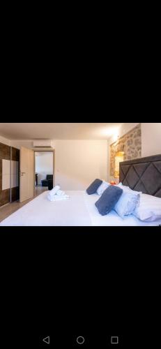 Postel nebo postele na pokoji v ubytování Apartments Ante 1