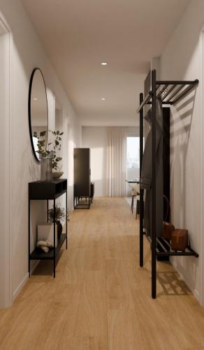 a living room with a mirror and a table at Exklusives Wohnen in Bestlage - II in Heubach
