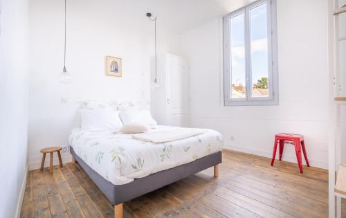 Postel nebo postele na pokoji v ubytování Grand Duplex avec Spa et Parking privé- 8 personnes