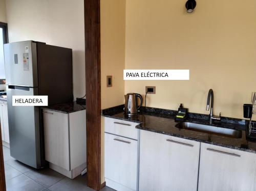 Una cocina o zona de cocina en Posada Los Chañares