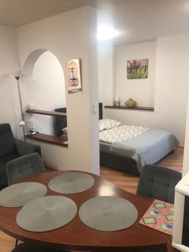 A bed or beds in a room at Apartament studio