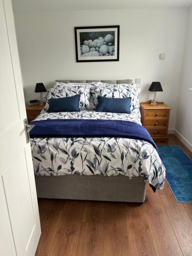 Postel nebo postele na pokoji v ubytování Wrenmar