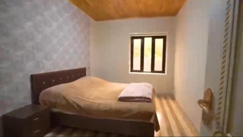 Postel nebo postele na pokoji v ubytování Kiraye Evler