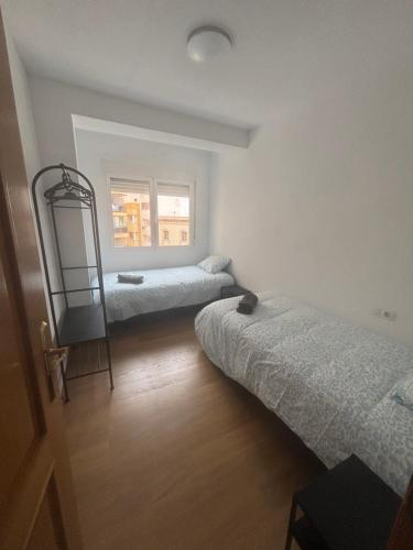 En eller flere senge i et værelse på Calderon centro Almeria