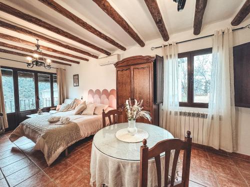 A bed or beds in a room at El Vergel de Berchules