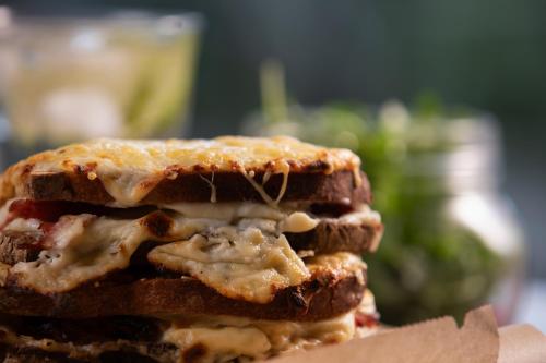 a close up of a sandwich cut in half at Campanile Strasbourg - Illkirch Geispolsheim in Geispolsheim