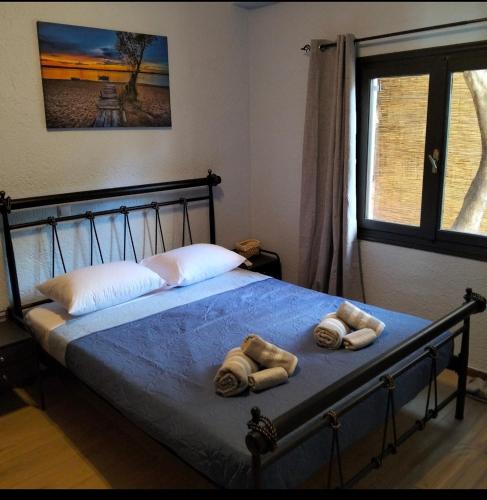 Letto o letti in una camera di Agali Apartments