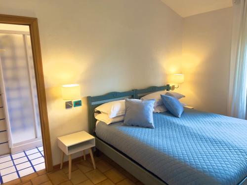Posteľ alebo postele v izbe v ubytovaní Villa Lavinia B&B