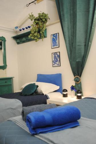 Postel nebo postele na pokoji v ubytování Sun Flowers House